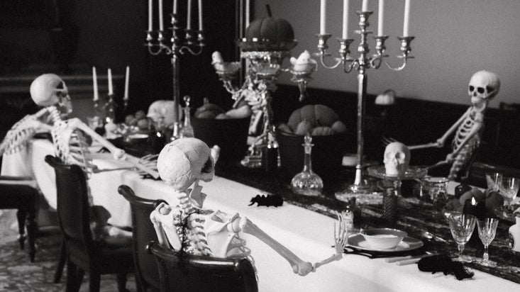 Skeletons enjoy a dinner party in the dining room of Wimpole Hall, at Wimpole Estate, Cambridgeshire